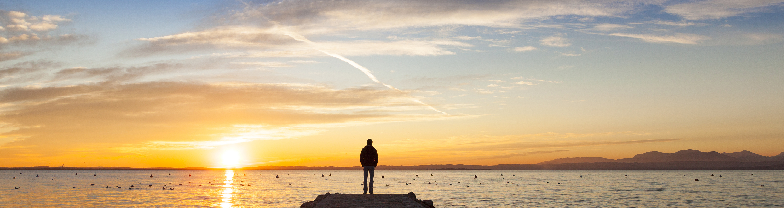 Man thinking at lake